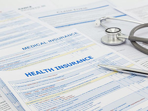 A display of several health insurance forms